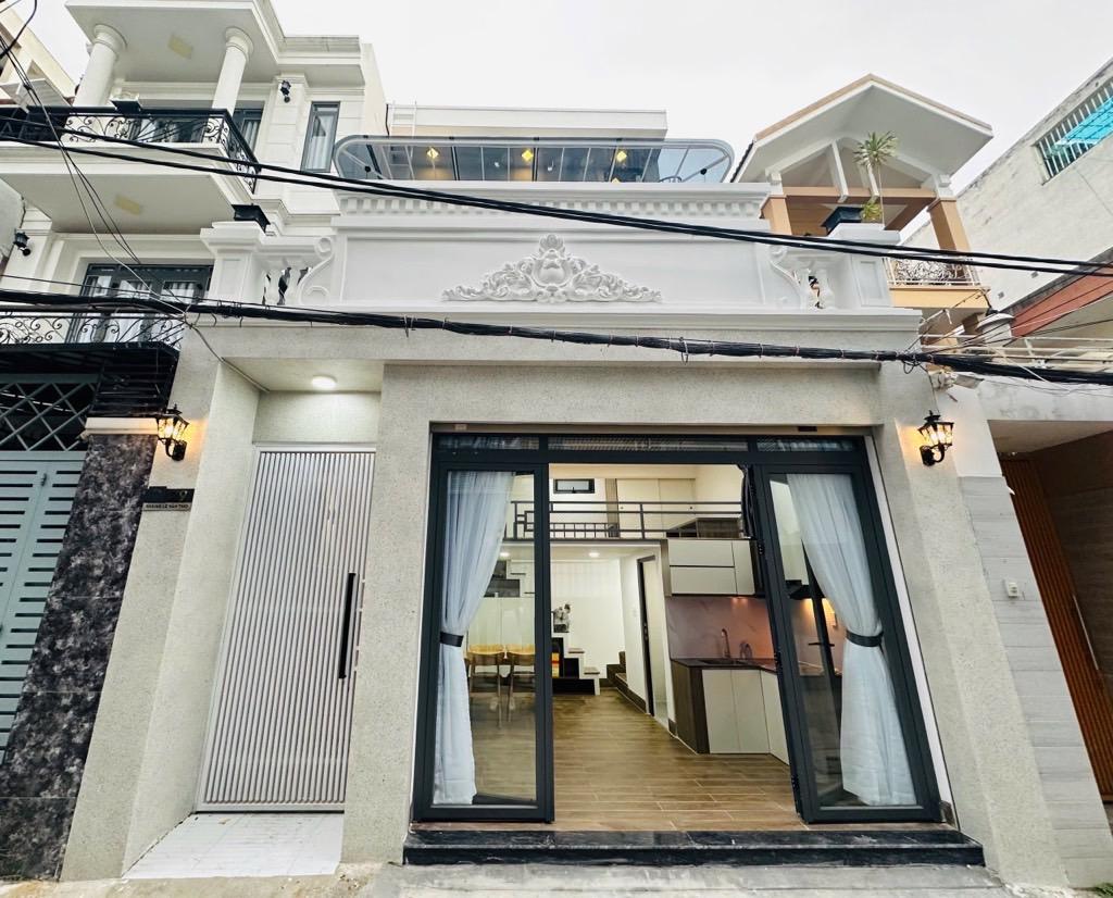 Ban nha Le Van Tho 6.1x21m cho thue 1 ty.nam 15.9 ty 1